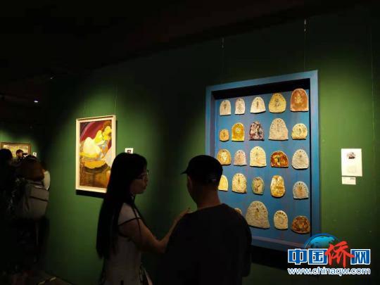 骑楼老街吹来北国与南海的风——北京、海南女画家作品展海口开幕侧记
